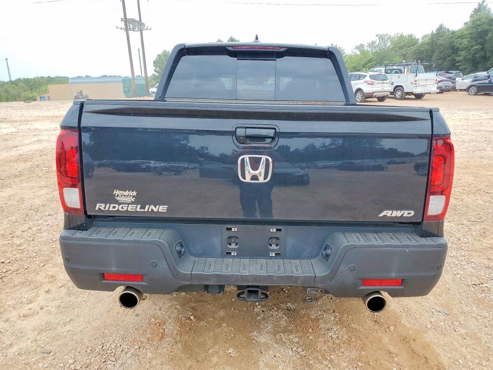 Photo 6 from auction – 2023 HONDA RIDGELINE with VIN 5FPYK3F83PB026154