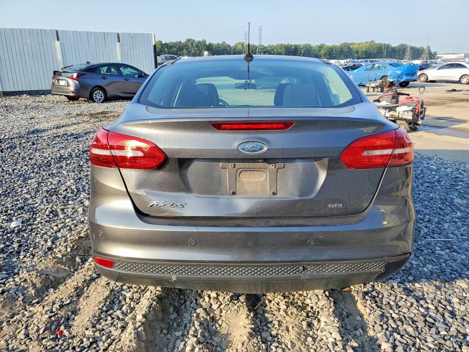 Foto 6 de la subasta – 2017 FORD FOCUS con VIN 1FADP3H2XHL317241