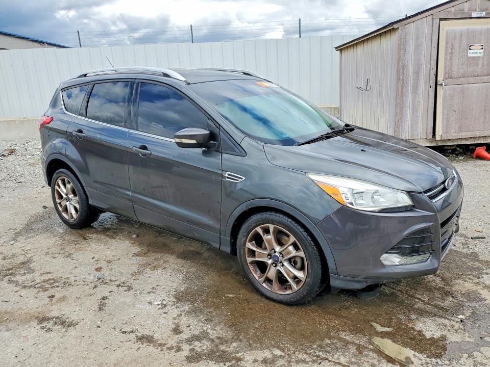 Photo 4 from auction – 2016 FORD ESCAPE with VIN 1FMCU9J98GUC30595
