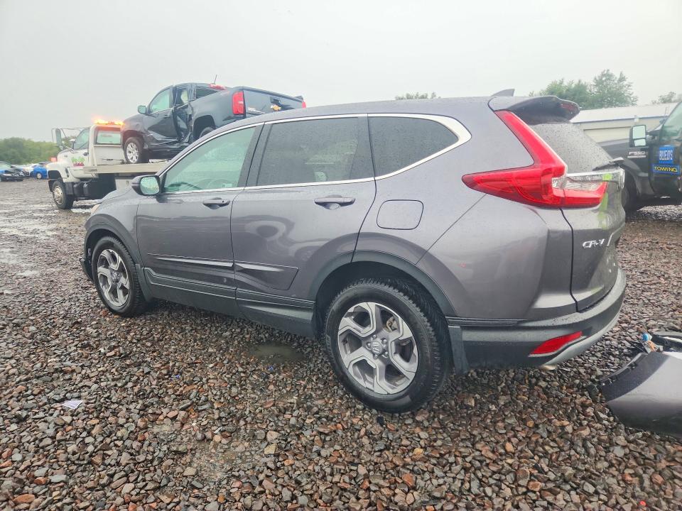 Photo 2 from auction – 2018 HONDA CR-V with VIN 7FARW2H87JE085177