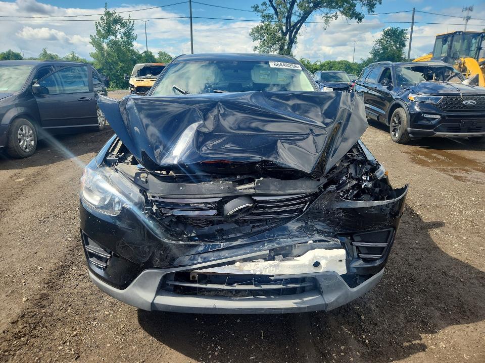 Photo 5 from auction – 2016 MAZDA CX-5 with VIN JM3KE2BE0G0656179