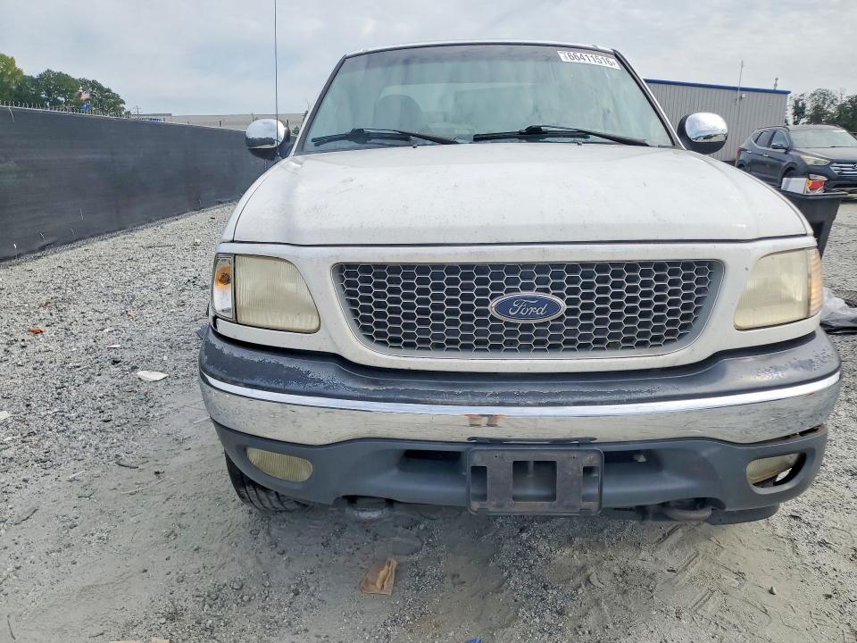 Photo 5 from auction – 1999 FORD F150 with VIN 1FTRX18LXXNC06379