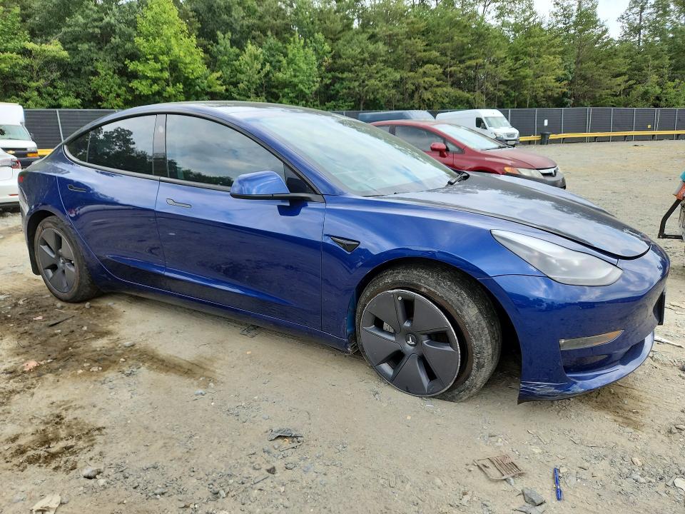Снимка 4 от търг – 2023 TESLA MODEL 3 с VIN 5YJ3E1EB9PF635356