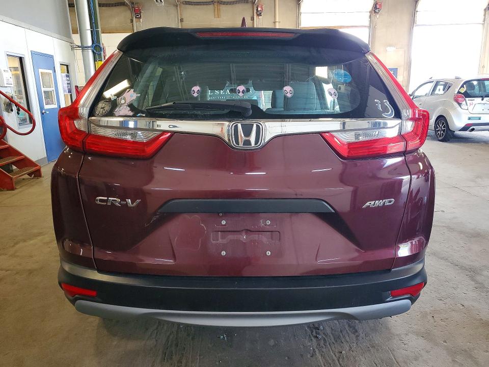 Photo 6 from auction – 2017 HONDA CR-V with VIN 5J6RW6H39HL007945
