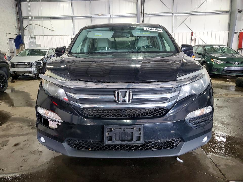 Photo 5 from auction – 2016 HONDA PILOT with VIN 5FNYF6H57GB067503