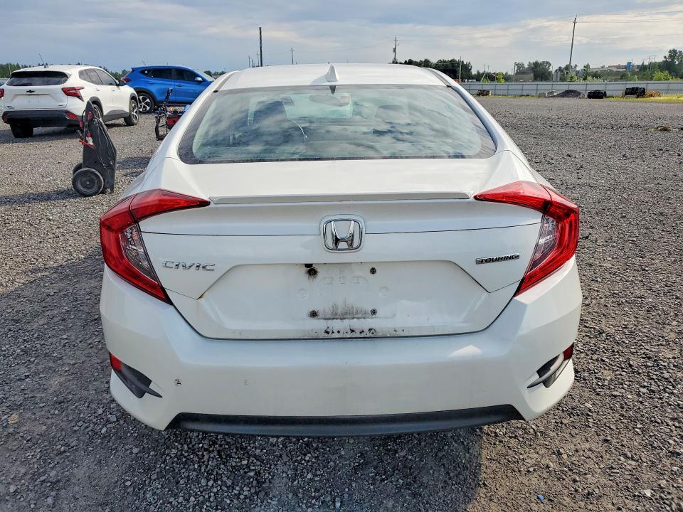 Photo 6 from auction – 2018 HONDA CIVIC with VIN 2HGFC1F97JH105498