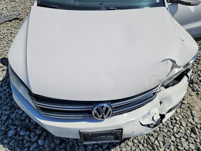 Photo 11 from auction – 2013 VOLKSWAGEN TIGUAN with VIN WVGBV3AX5DW597183