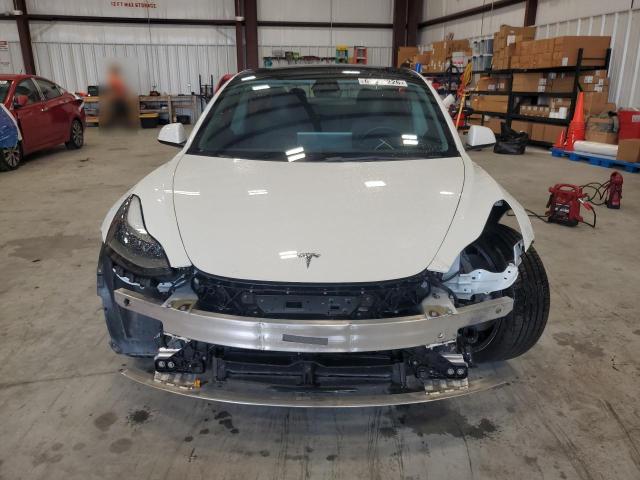 Photo 5 from auction – 2022 TESLA MODEL 3 with VIN 5YJ3E1EC5NF165753