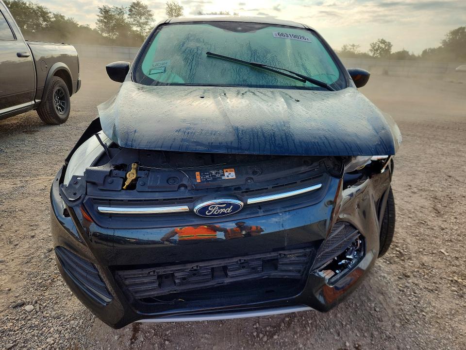 Photo 5 from auction – 2016 FORD ESCAPE with VIN 1FMCU9GX1GUA62238