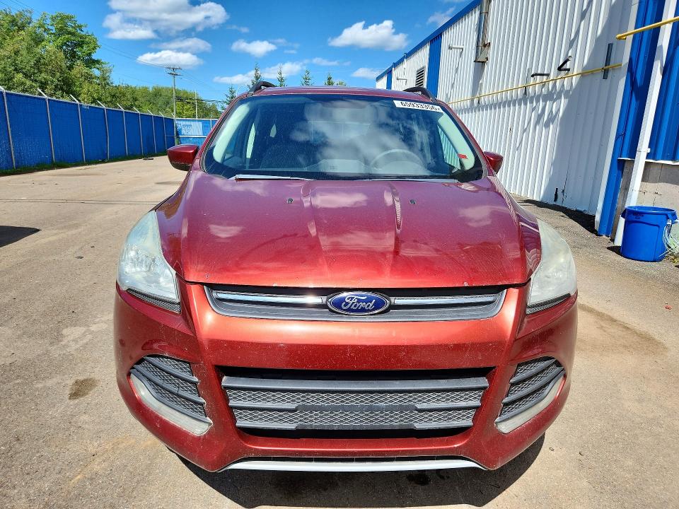 Photo 5 from auction – 2015 FORD ESCAPE with VIN 1FMCU9GX4FUB21829