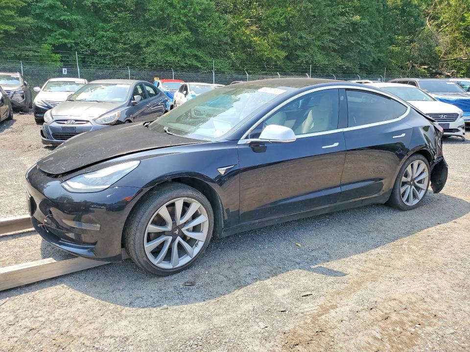 TESLA MODEL 3 2018 with VIN 5YJ3E1EB0JF097072 - Photo from auction