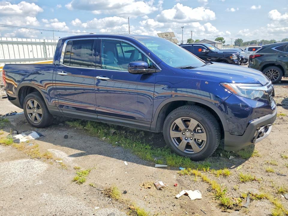 Photo 4 from auction – 2020 HONDA RIDGELINE with VIN 5FPYK3F77LB008922