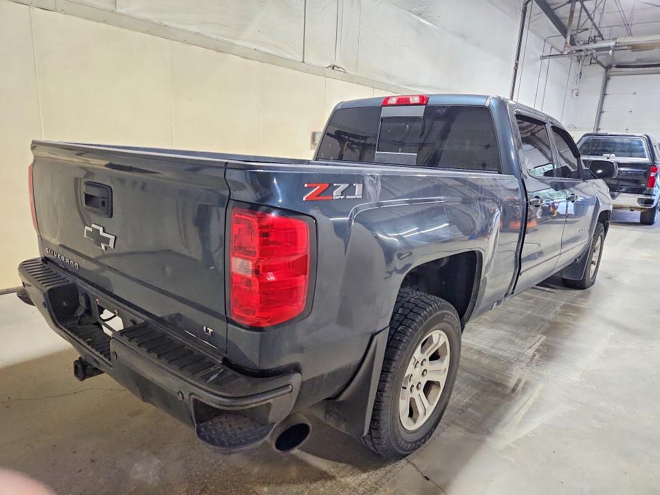 Photo 3 from auction – 2018 CHEVROLET SILVERADO with VIN 1GCUKREC7JF104681