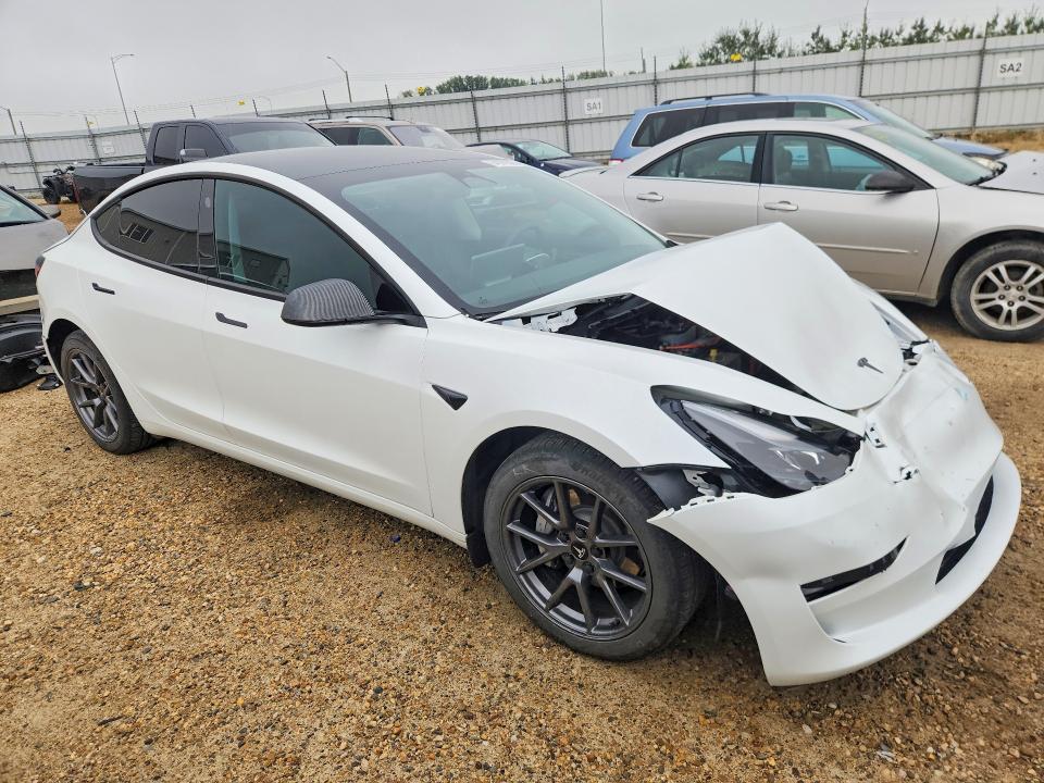 Photo 4 from auction – 2023 TESLA MODEL 3 with VIN LRW3E1FA0PC871958
