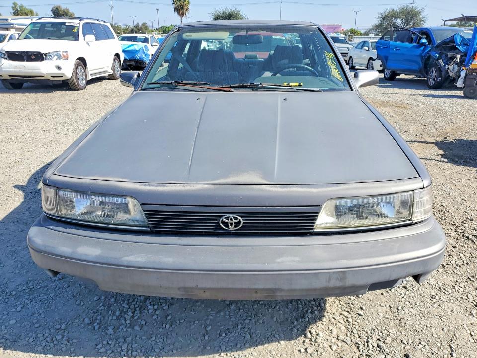 Photo 5 from auction – 1990 TOYOTA CAMRY with VIN 4T1SV22E4LU246590