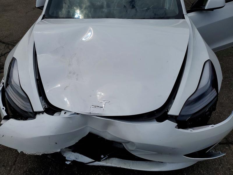 Photo 11 from auction – 2023 TESLA MODEL 3 with VIN 5YJ3E1EC4PF420671