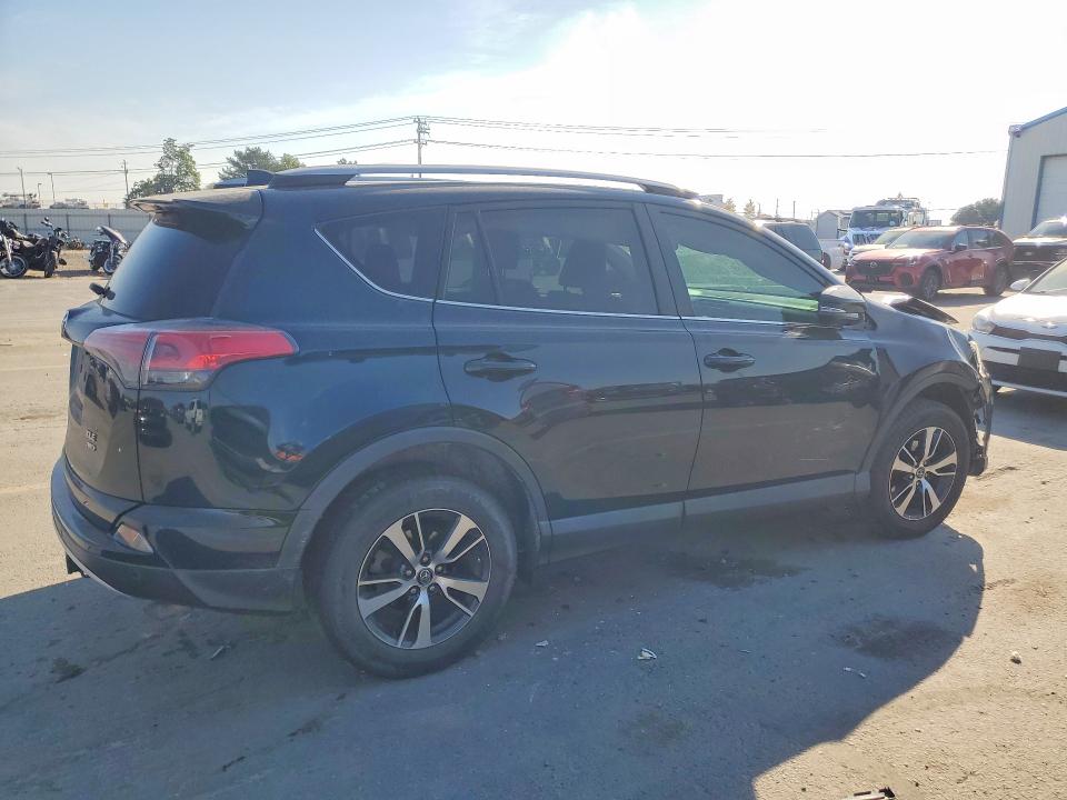 Photo 3 from auction – 2017 TOYOTA RAV4 with VIN 2T3RFREV4HW550193