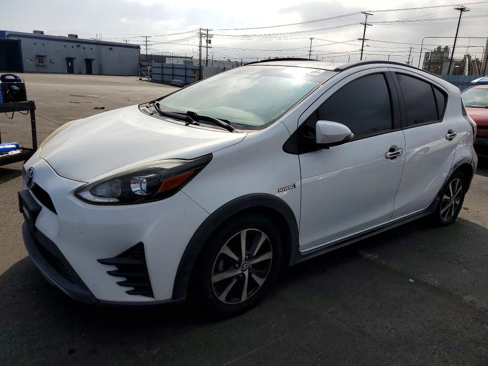 TOYOTA PRIUS C 2018 with VIN JTDKDTB37J1617283 - Photo from auction