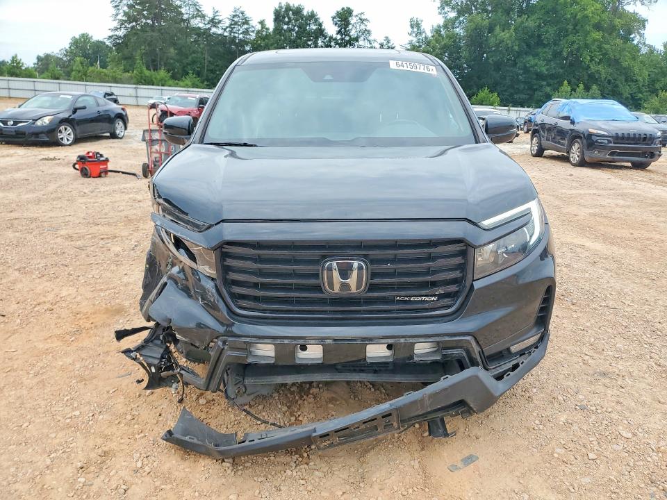 Photo 5 from auction – 2023 HONDA RIDGELINE with VIN 5FPYK3F83PB026154