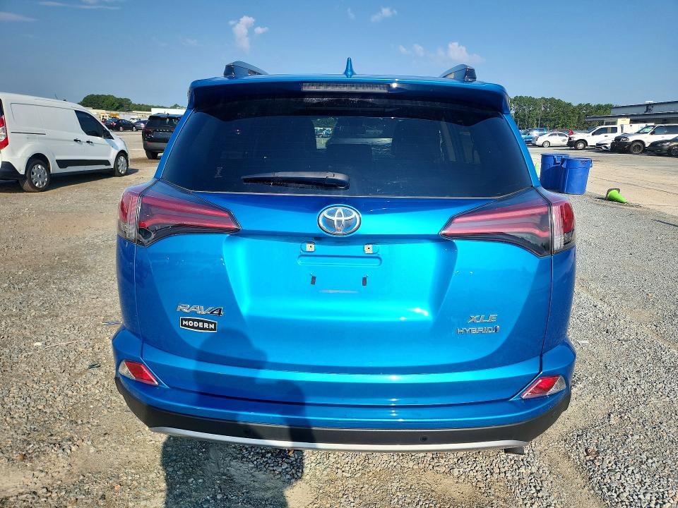 Photo 6 from auction – 2018 TOYOTA RAV4 HYBRID with VIN JTMRJREVXJD222066