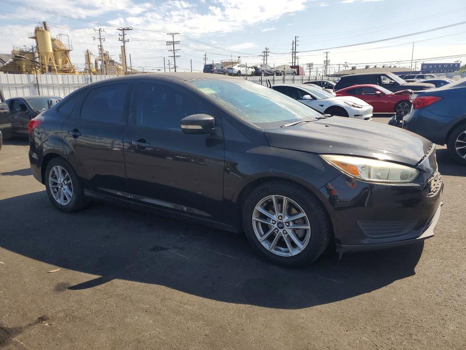 Photo 4 from auction – 2015 FORD FOCUS with VIN 1FADP3F25FL334562