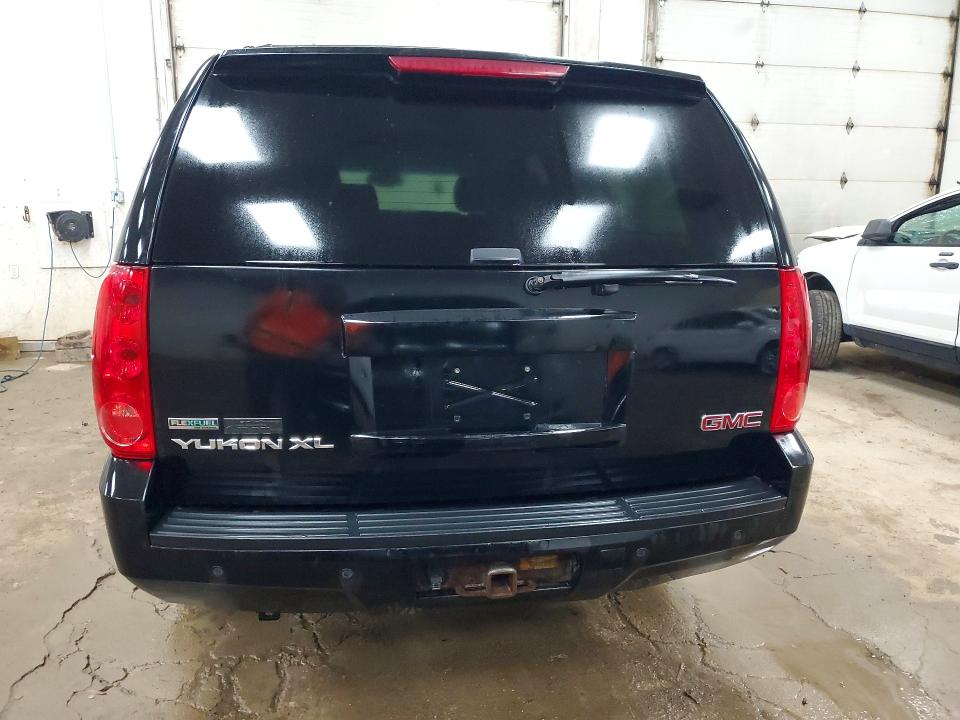 Photo 6 from auction – 2011 GMC YUKON XL with VIN 1GKS2LE39BR343089