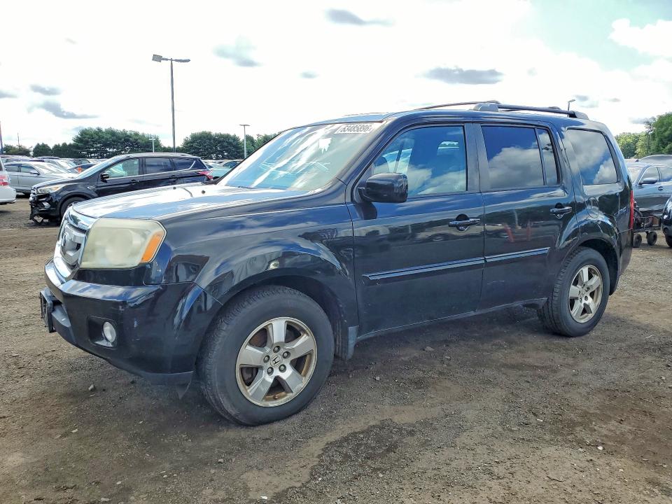 HONDA PILOT 2011 with VIN 5FNYF4H64BB062426 - Photo from auction