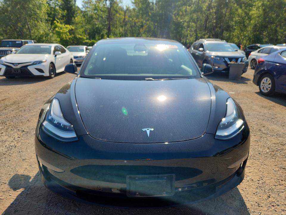 Фото 5 с аукциона – 2021 TESLA MODEL 3 с VIN 5YJ3E1EAXMF857231