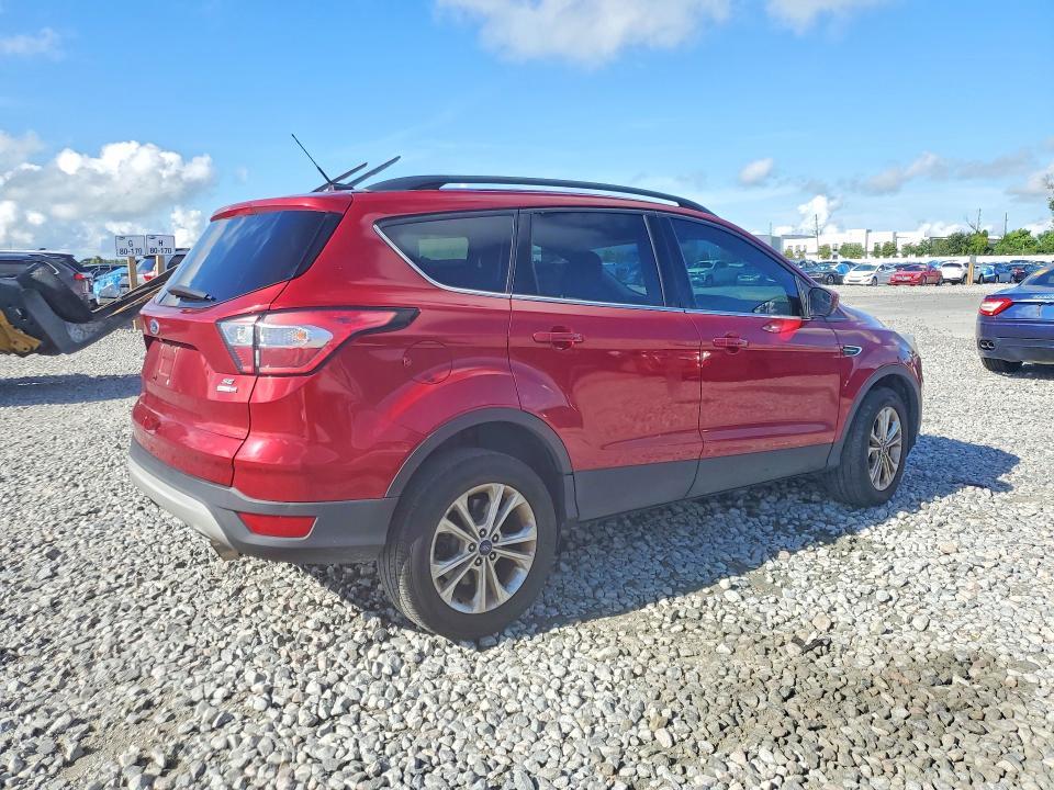 Photo 3 from auction – 2018 FORD ESCAPE with VIN 1FMCU9GD7JUB68500