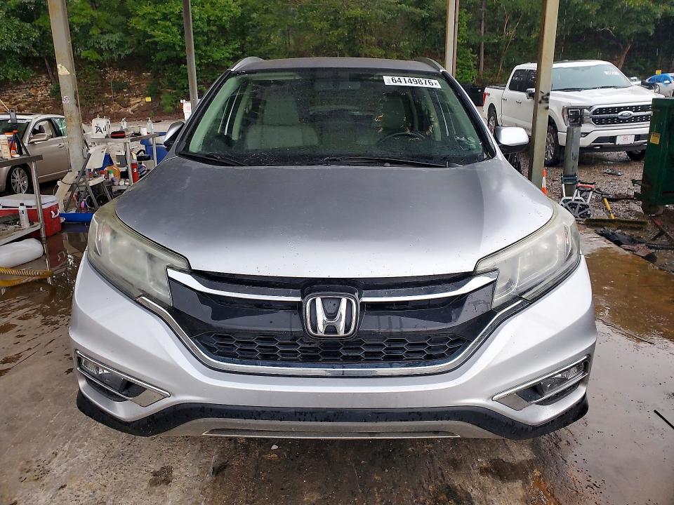 Photo 5 from auction – 2015 HONDA CR-V with VIN 2HKRM3H78FH514365