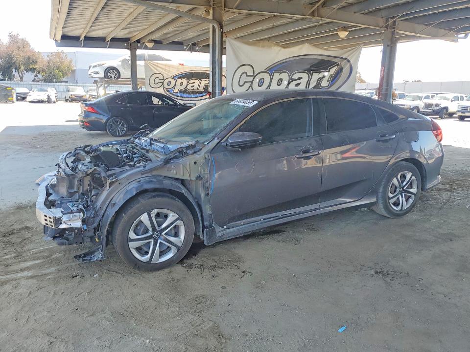 HONDA CIVIC 2017 with VIN 2HGFC2F5XHH524104 - Photo from auction
