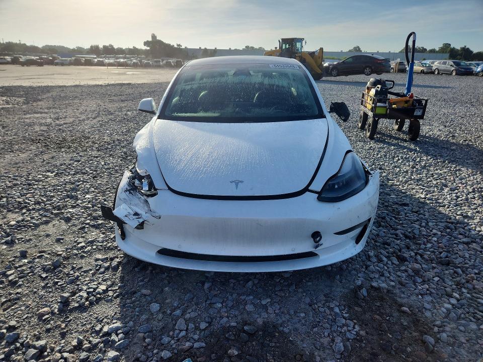 Photo 5 from auction – 2021 TESLA MODEL 3 with VIN 5YJ3E1EA3MF047522