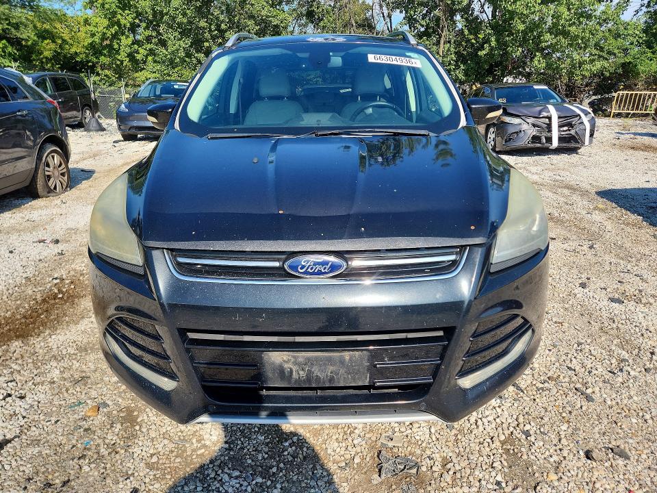 Photo 5 from auction – 2014 FORD ESCAPE with VIN 1FMCU0J99EUA94583