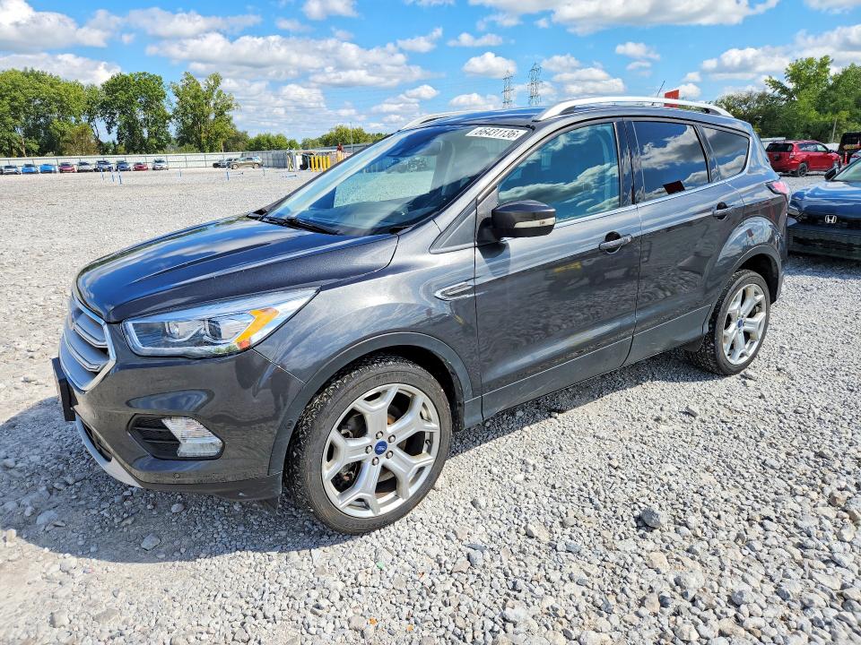 FORD ESCAPE 2018 with VIN 1FMCU9J92JUD43255 - Photo from auction