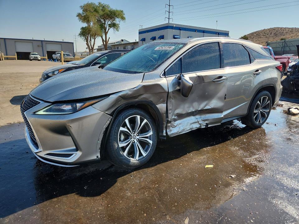 LEXUS RX 2020 with VIN 2T2HZMDA2LC237811 - Photo from auction