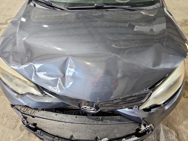 Photo 11 from auction – 2014 TOYOTA COROLLA with VIN 2T1BURHE9EC036087