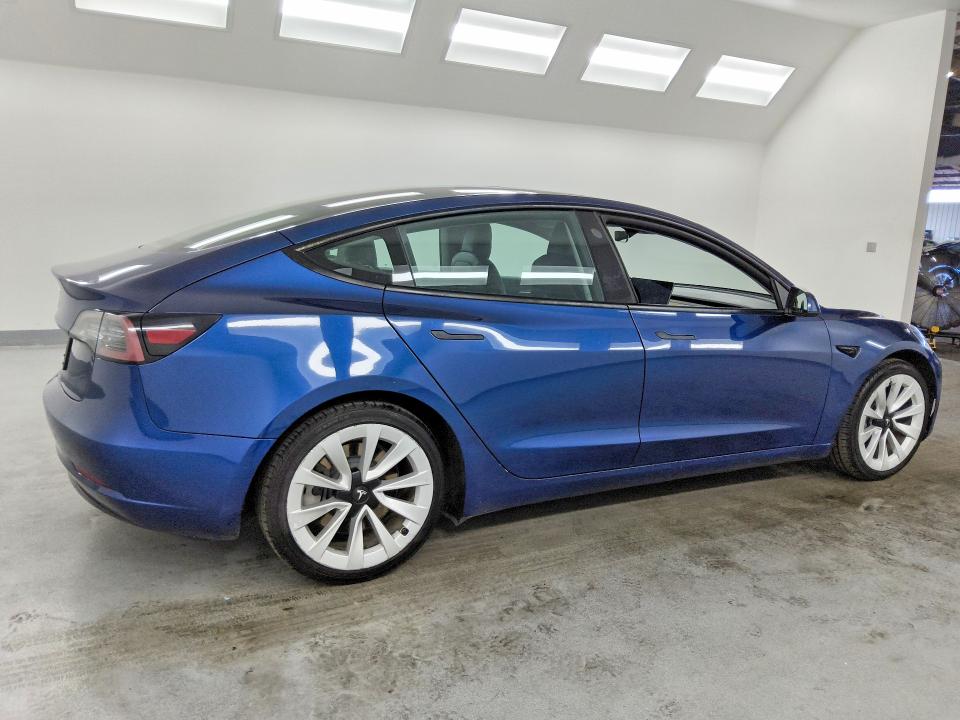 Photo 3 from auction – 2022 TESLA MODEL 3 with VIN 5YJ3E1EA7NF189602