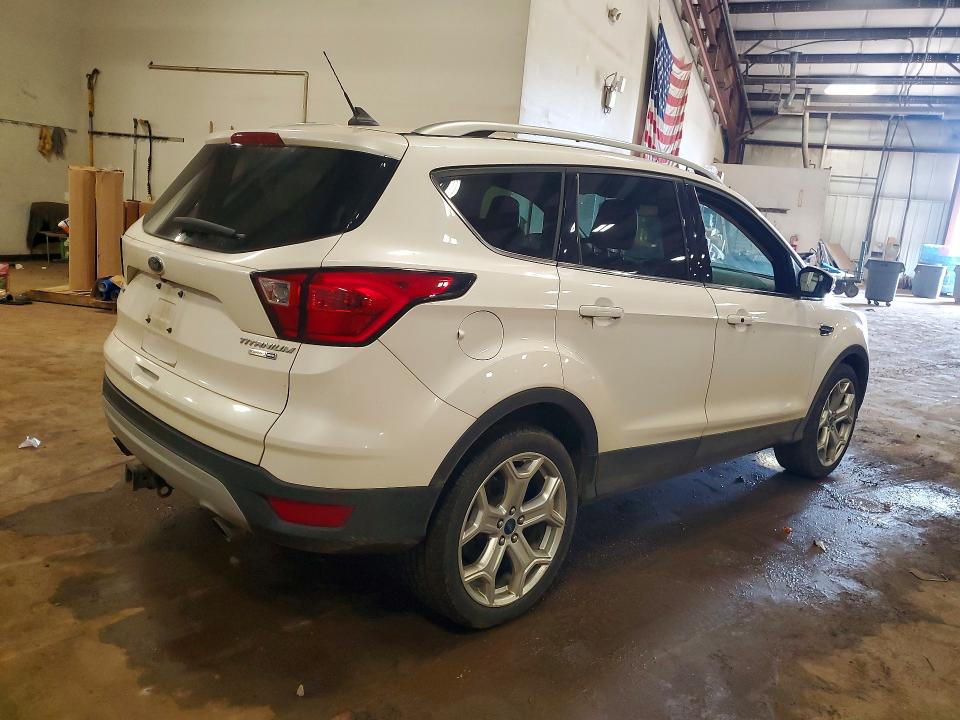 Photo 3 from auction – 2019 FORD ESCAPE with VIN 1FMCU9J98KUA33922