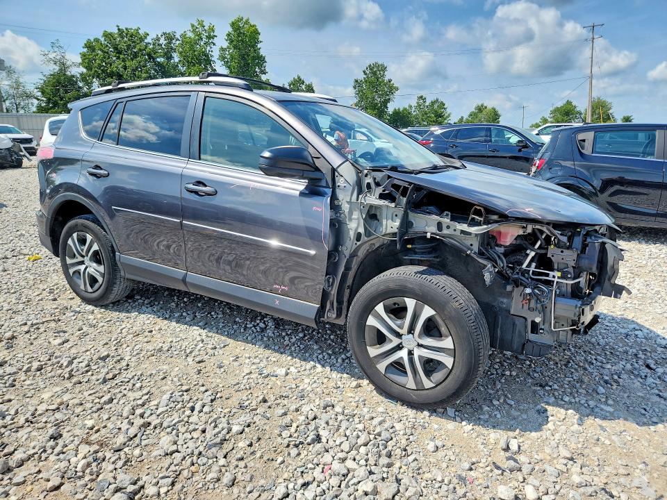 Photo 4 from auction – 2016 TOYOTA RAV4 with VIN JTMZFREV0GJ072206