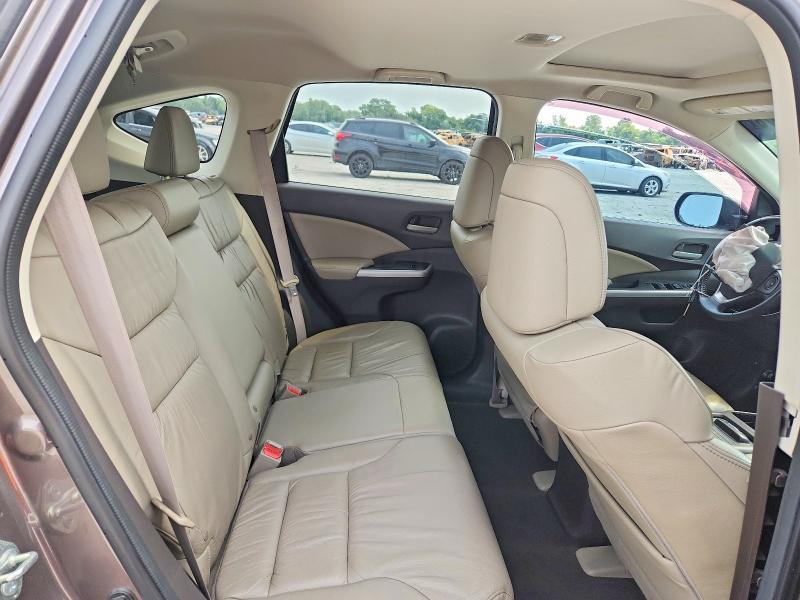 Photo 11 from auction – 2014 HONDA CR-V with VIN 2HKRM3H77EH553608