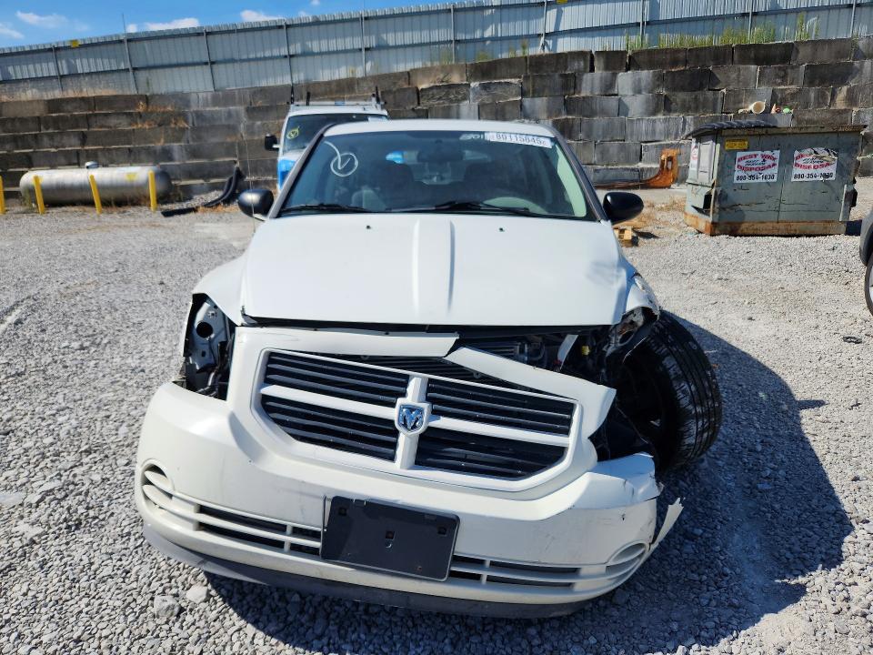Photo 5 from auction – 2009 DODGE CALIBER with VIN 1B3HB48A19D150529