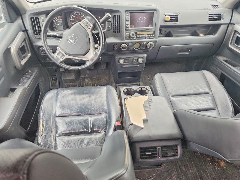 Photo 8 from auction – 2014 HONDA RIDGELINE with VIN 5FPYK1F60EB011367