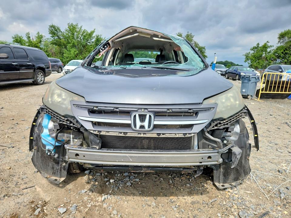 Photo 5 from auction – 2013 HONDA CR-V with VIN 2HKRM3H39DH504244