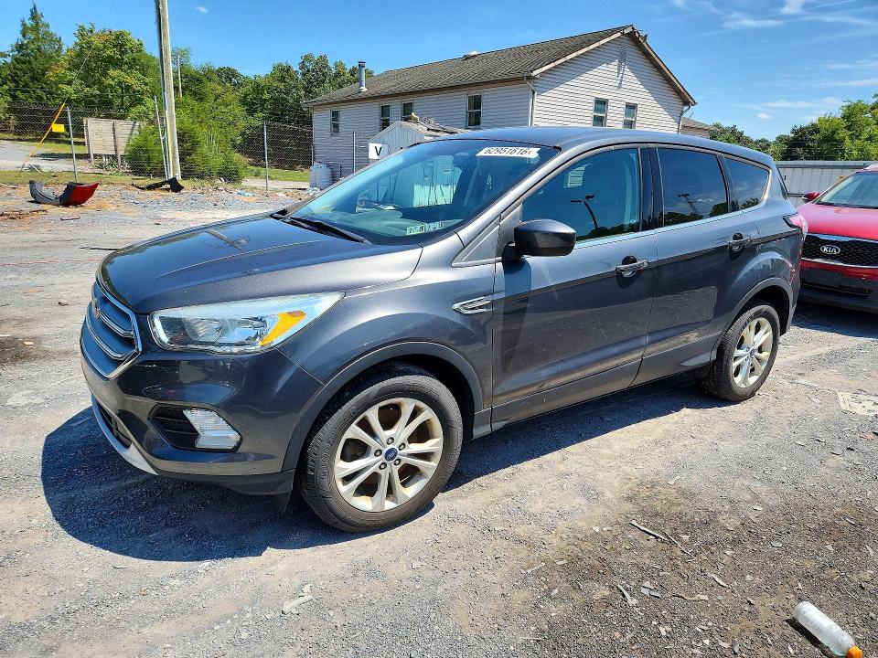 FORD ESCAPE 2017 with VIN 1FMCU9GDXHUD63811 - Photo from auction