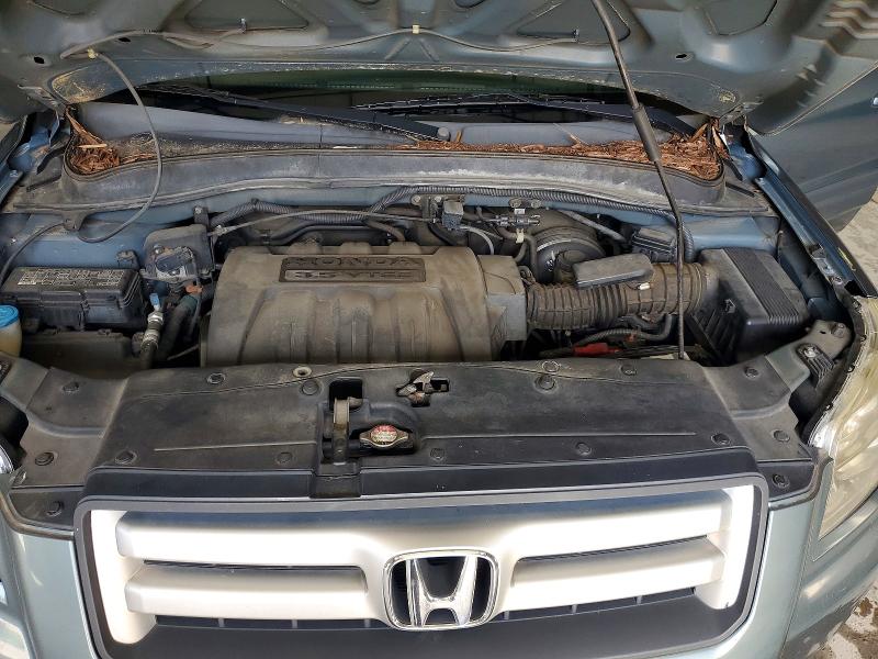 Photo 12 from auction – 2006 HONDA PILOT with VIN 5FNYF18566B022036