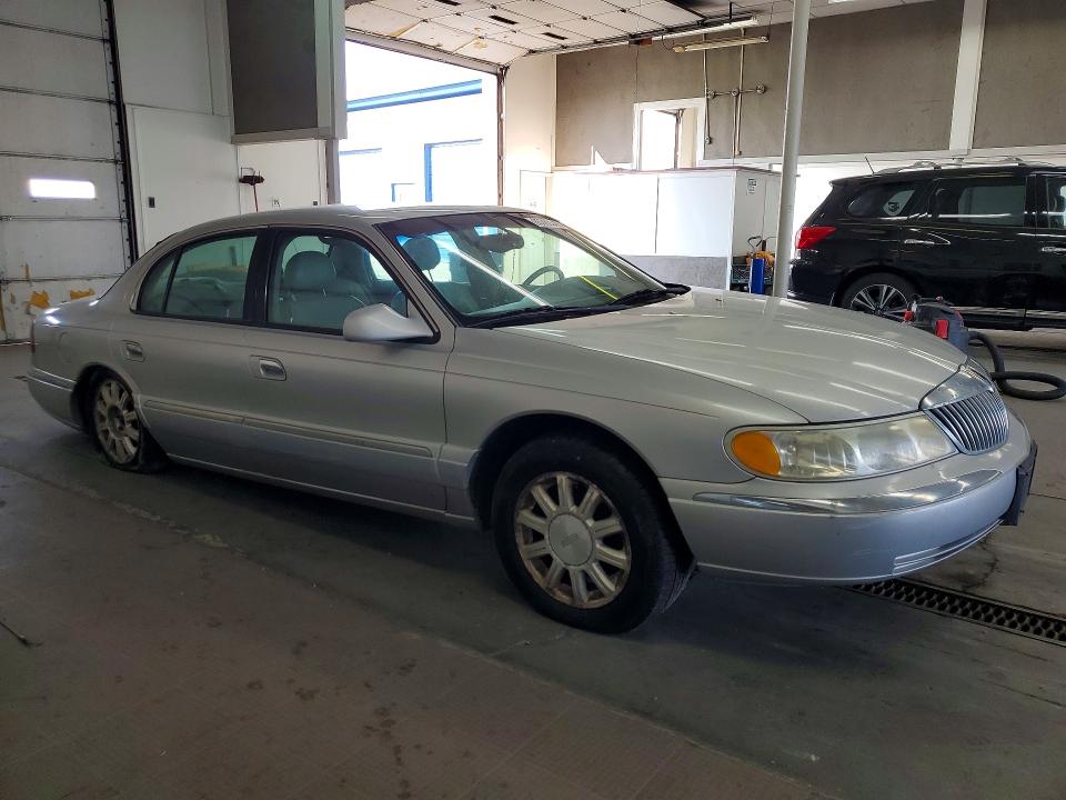 Photo 4 from auction – 2000 LINCOLN CONTINENTAL with VIN 1LNHM97VXYY785682