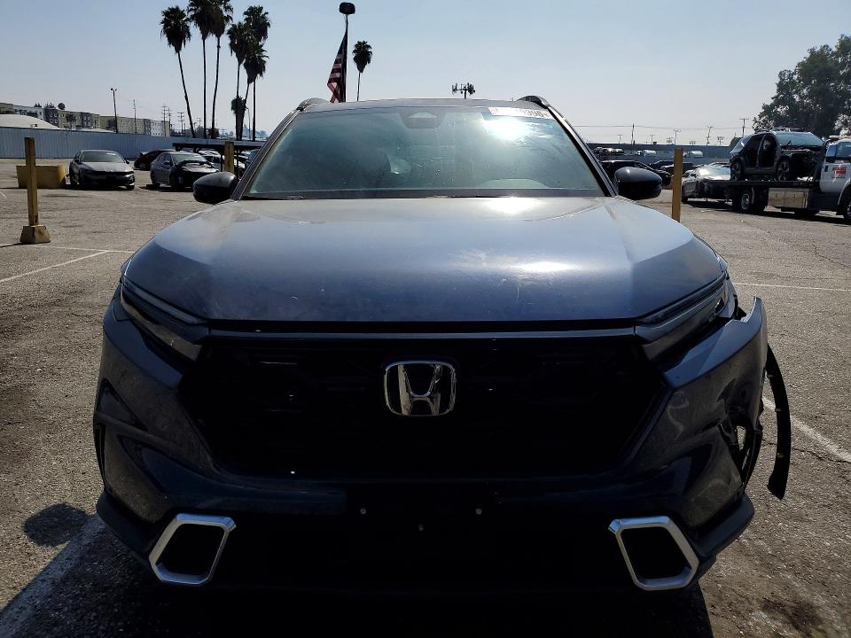 Photo 5 from auction – 2023 HONDA CR-V with VIN 7FARS6H91PE000063