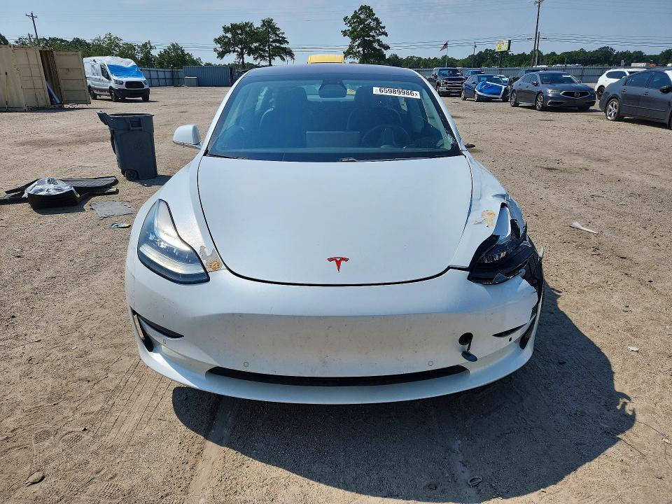 Photo 5 from auction – 2018 TESLA MODEL 3 with VIN 5YJ3E1EA0JF053984