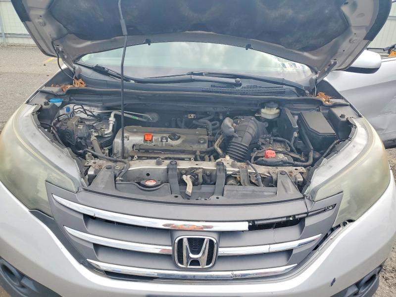 Photo 12 from auction – 2013 HONDA CR-V with VIN 3CZRM3H50DG702540