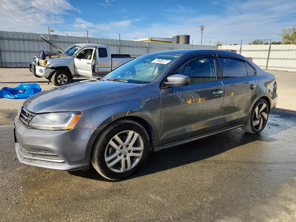 VOLKSWAGEN JETTA 2018 with VIN 3VW2B7AJ9JM215312 - Photo from auction